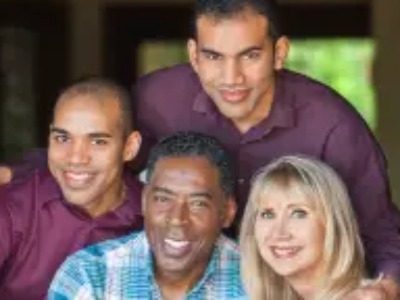 Linda Kingsberg with her husband Ernie Hudson and sons Andrew and Ross Hudson.